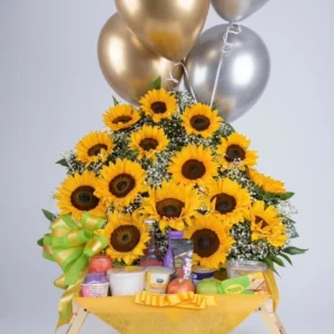 Desayuno sorpresa con girasoles y globos con helio